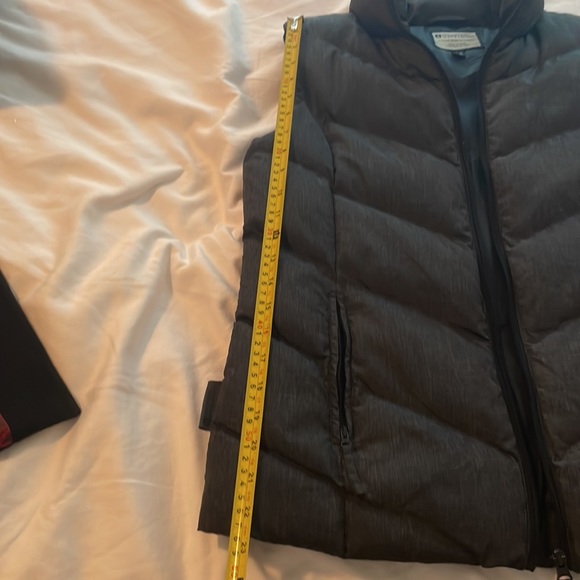 Gray puffy vest very warm. It was in the closet for a while. Never been used. - Picture 3 of 4